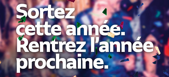 Image où il est inscrit "Sortez cette année. Rentrez l'année prochaine." en référence au 31 décembre 2025.